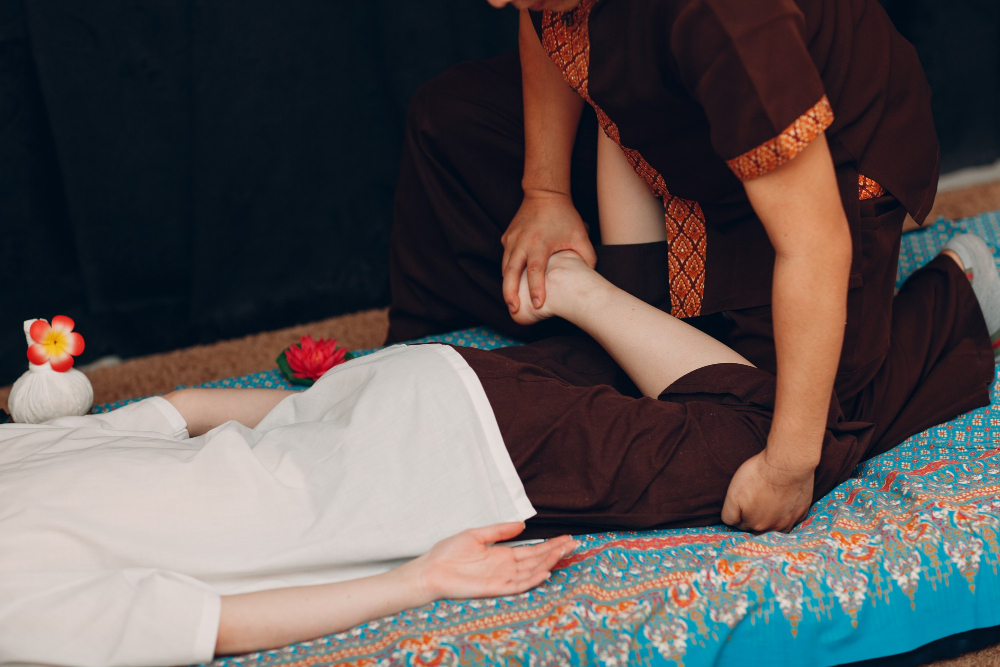 thai-man-making-classical-thai-massage-procedure-young-woman-beauty-spa